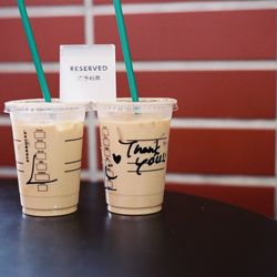 Reserved sign on coffee served on table