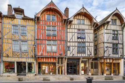 Exterior of buildings against sky in city