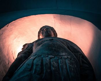 Low angle view of statue against building