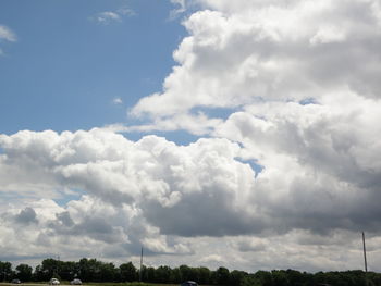 Scenic view of landscape against cloudy sky