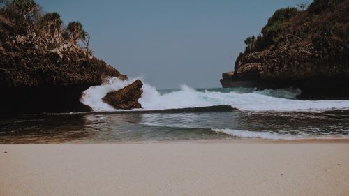 Scenic view of sea against clear sky