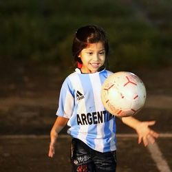 Portrait of boy playing