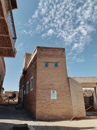 Low angle view of old building against sky