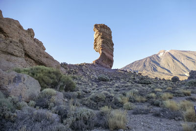 Scenic view of mountains against clear sky