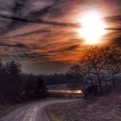 Empty road at sunset