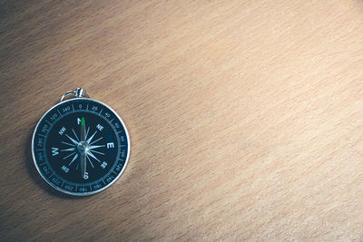 High angle view of information sign on table