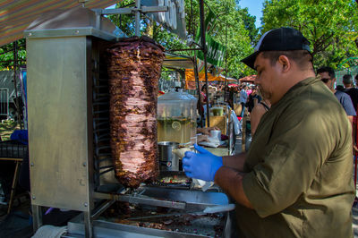 Man preparing food at shop