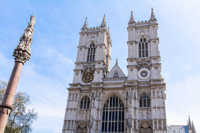 Low angle view of westminster abbey against sky