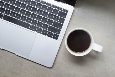 High angle view of coffee cup on table