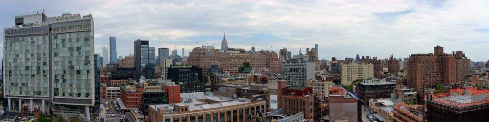 Modern buildings in city against sky