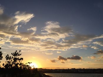 Scenic view of silhouette trees against sky during sunset