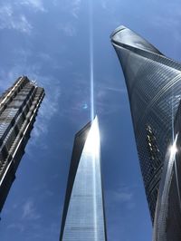 Low angle view of modern buildings against sky