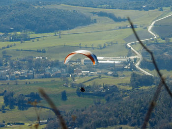 Aerial view of hot air balloon flying over land