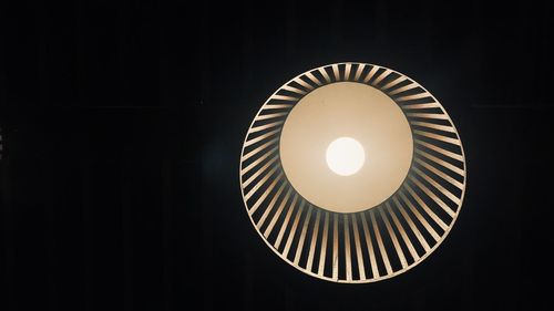 Low angle view of illuminated ceiling