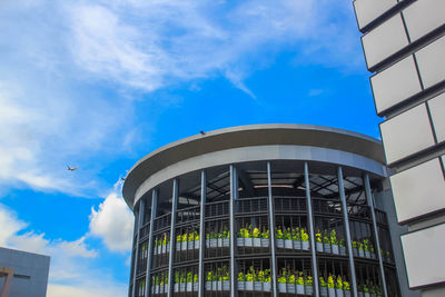 Low angle view of building against blue sky