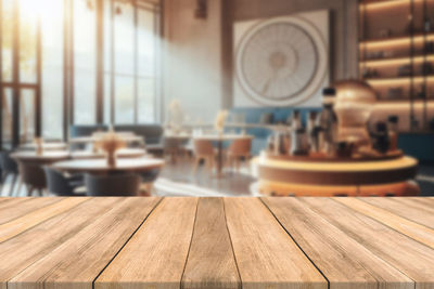 Close-up of wooden table at home