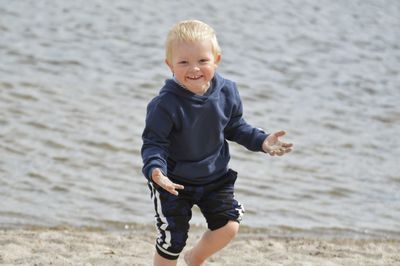 Portrait of smiling boy at beach