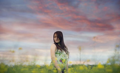 Woman standing on field