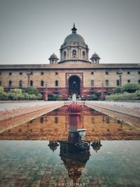 Reflection of building in water