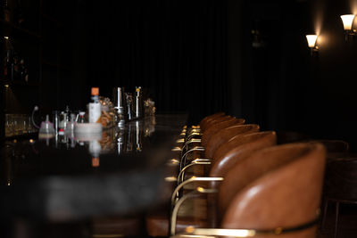 High angle view of illuminated candles in row