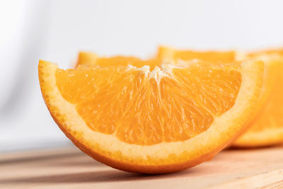 Close-up of orange slice on table