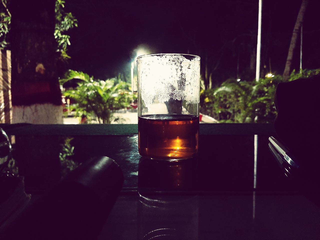 GLASS OF BEER ON TABLE