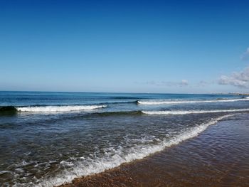 Scenic view of sea against clear sky