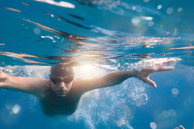 Man swimming in sea