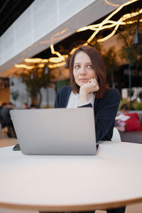 Businesswoman sitting at cafe