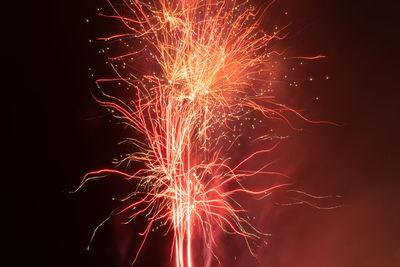 Firework display at night