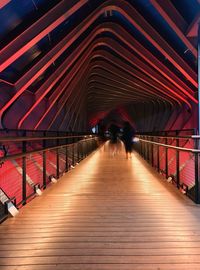 People walking on footbridge