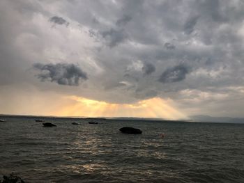 Scenic view of sea against sky during sunset