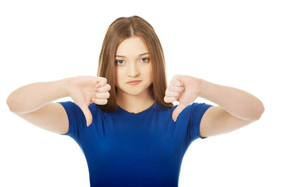 Portrait of a beautiful young woman over white background