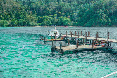 View of swimming pool against lake