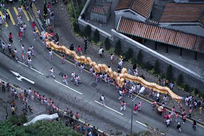 High angle view of people on street in city