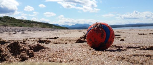 Surface level of ball on sandy beach