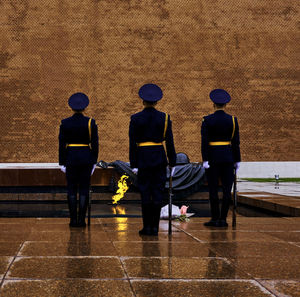 Rear view of people walking on floor in moscow