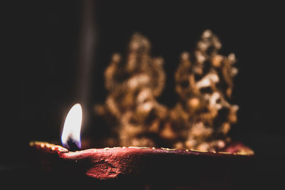 Close-up of burning candle