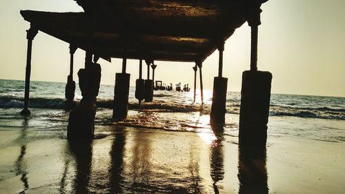 View of pier at sunset