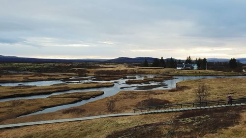 Scenic view of river against sky