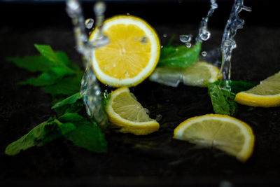 Lemon slices with mint leaves