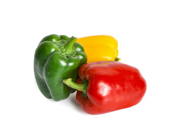 Close-up of red bell pepper against white background