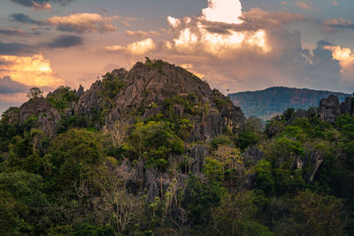 Scenic view of rocky mountains against sky during sunset
