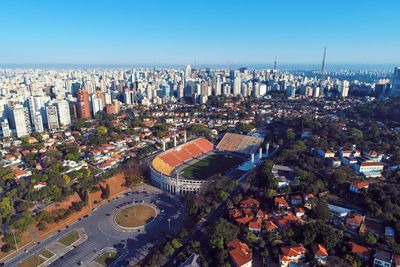 High angle view of modern buildings against clear sky