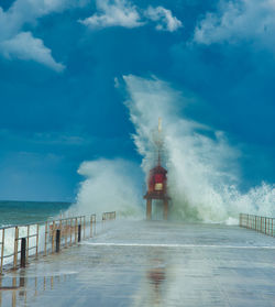 Panoramic view of pier over sea against sky