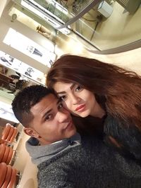 Portrait of a smiling young couple