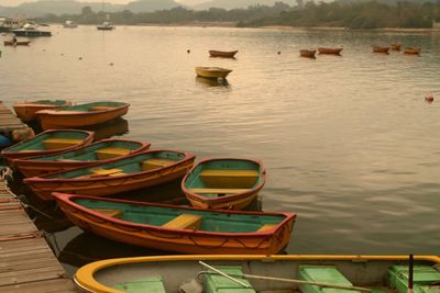 Boats moored in sea
