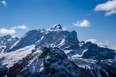 Scenic view of snowcapped mountains against sky