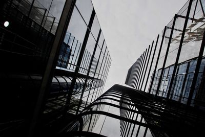 Low angle view of modern buildings against sky