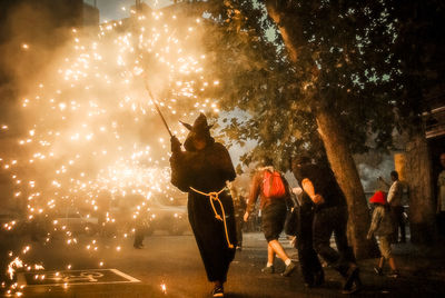 Firework display at night